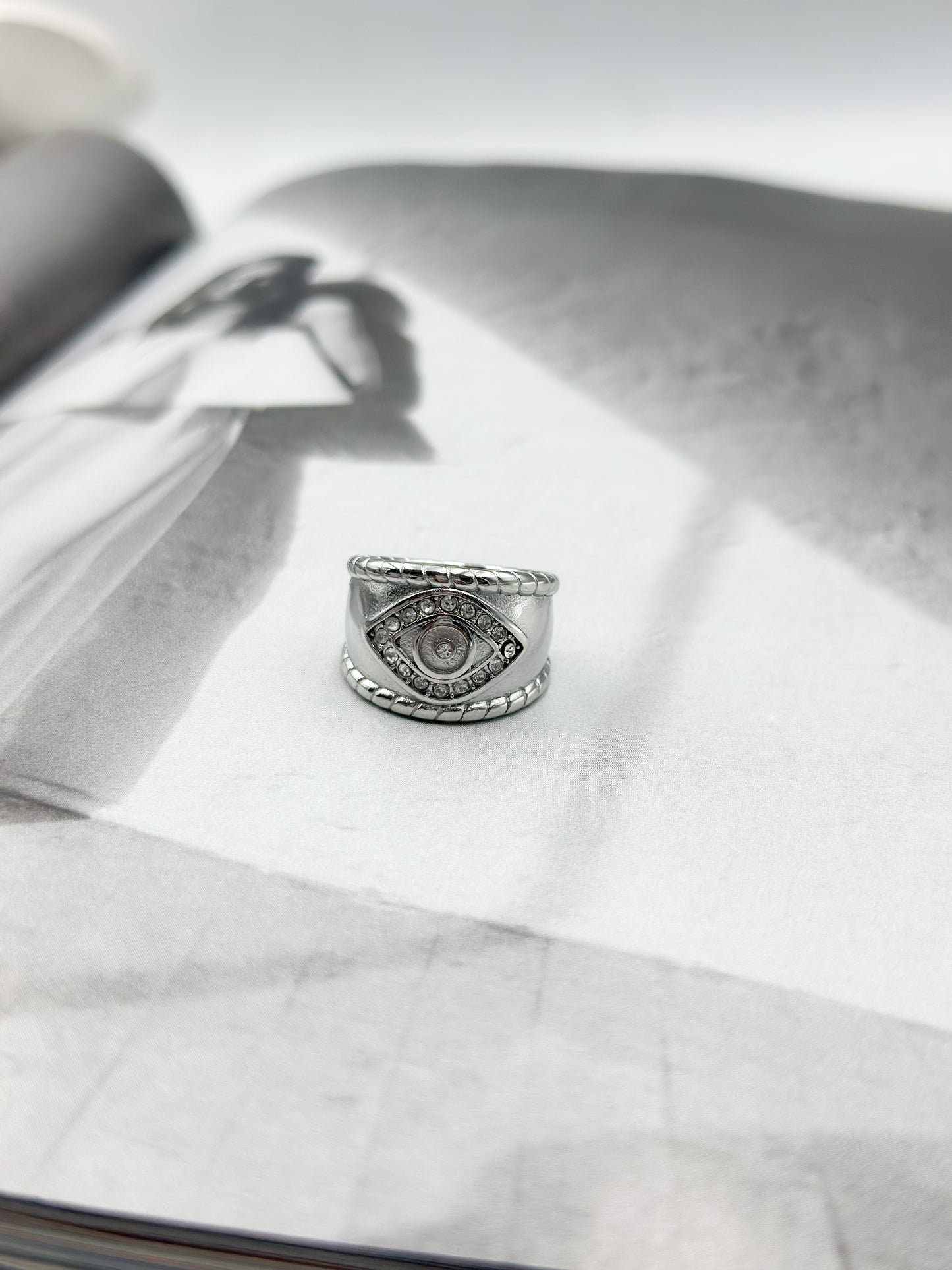 Zircon eye ring