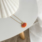 Shell handra necklace